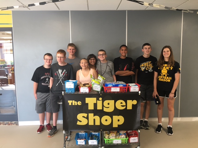 Several+students+that+help+with+Tiger+Shop+during+period+nine.+They+all+do+this+by+taking+care+of+student+customers+on+their+own+with+the+guidance+of+a+Mrs.Johnson+who+is+the+teacher+in+charge+of+Tiger+Shop.+From+left+to+right%3A+Eddie+Seskey%2C+Colin+Miller%2C+Mike+Drazga%2C+Annie+Messer%2C+Syler+Corona%2C+John+Funk%2C+Colin+Clifton%2C+Emmett+James%2C+Hannah+Campse.+Not+pictured+are+Jack+Roberts+and+Patrick+Birmingham.