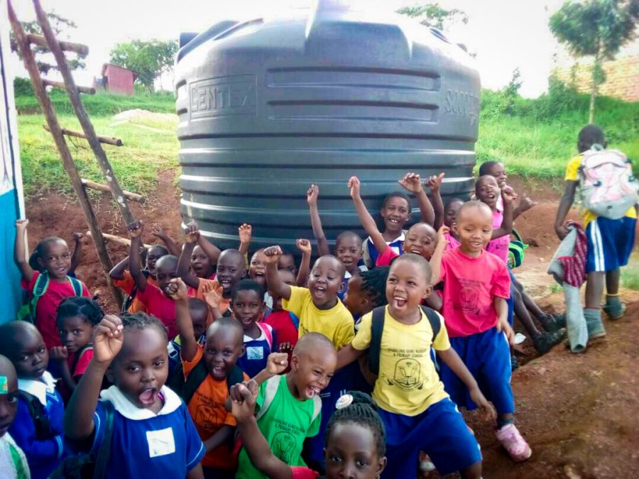Children in Uganda are overjoyed when they recieved a water harvesting system. 