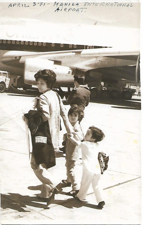My grandmother leaving the Philippines with her daughter (my mother).