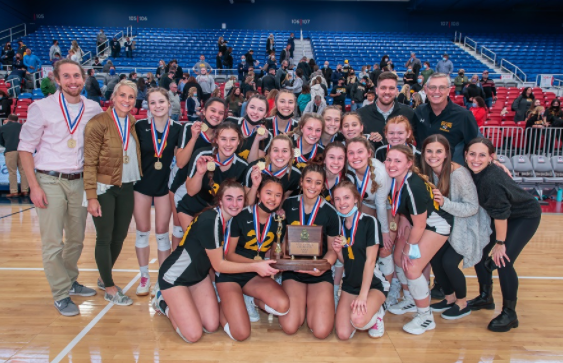 The Girls Volleyball Team poses after winning the 2021 WPIAL Championship.