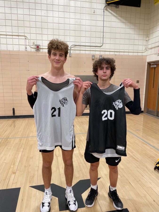 Evan Lyon and MJ Schwemmer jersey swamp after one of their NABA games.