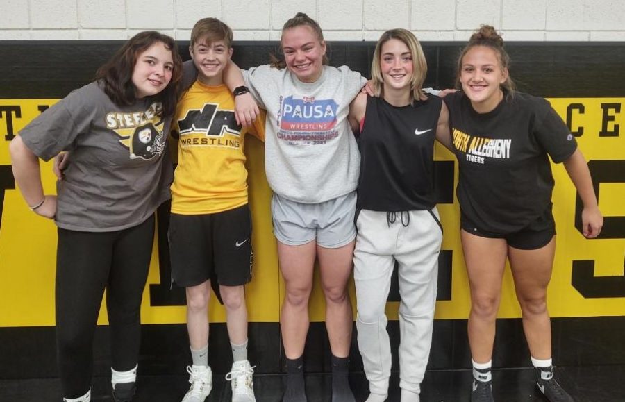 Members of NAs Womens Wrestling team pose after practice on November 19th, 2021