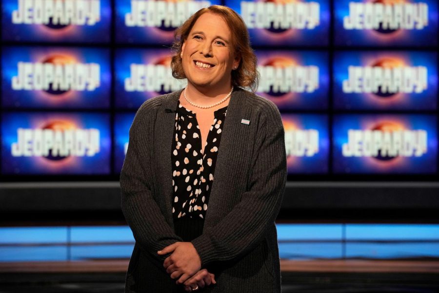 Amy Schneider is breaking records and barriers during a dominant Jeopardy! run.
