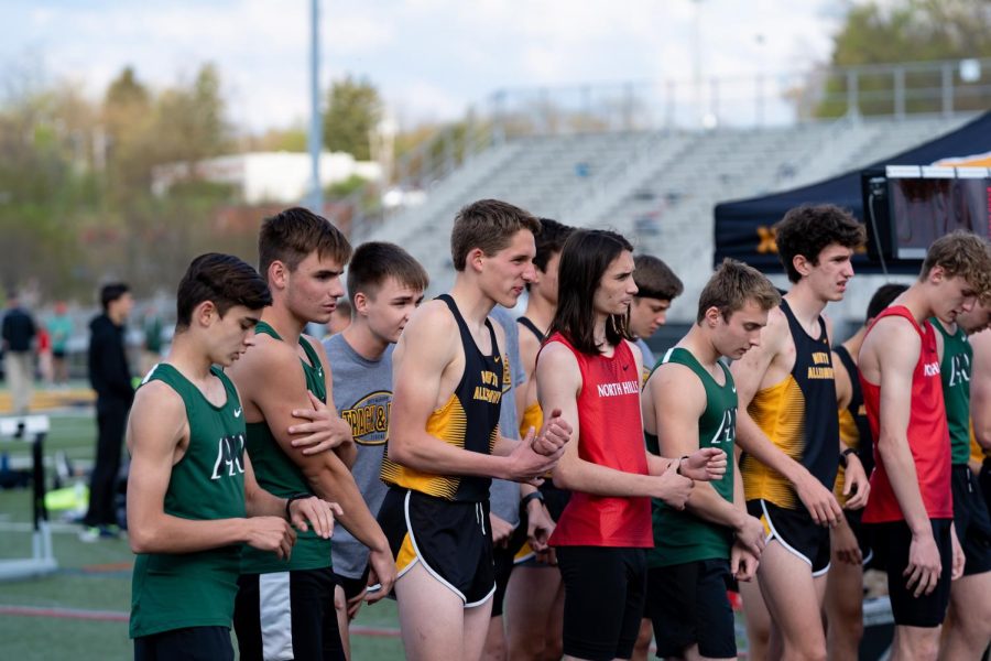 NA Track and Field participants wait before practice at the beginning of the new season.
