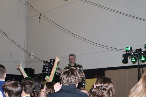 Mr. Geibel lays on the tracks at the Spring Semi Formal.