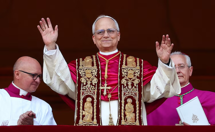 Pope Leo XIV giving his first address to the Vatican on the balcony of St. Peter's Basilica.